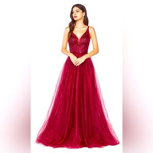 Evening/prom dress with tags.Color Burgundy.